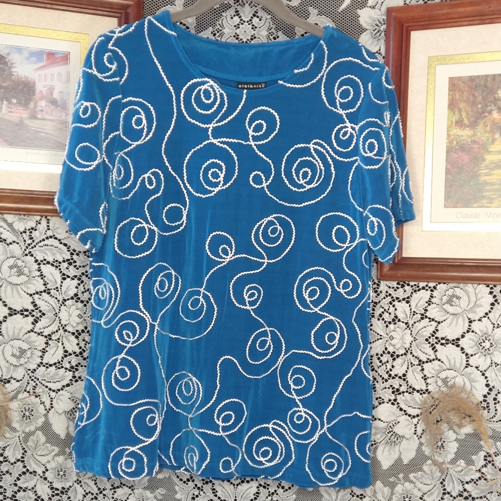 Citiknits blue with white applique loose fit stretch material with swirl design